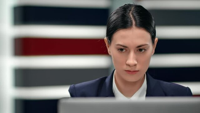 Closeup Asian business woman working use laptop at workplace. Shot on RED Raven 4k Cinema Camera