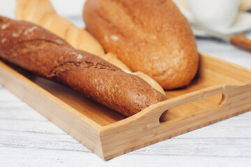 fresh loaf bread bins on the table kitchen food ration breakfast