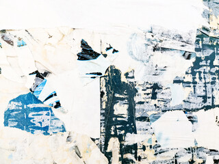 Vintage old posters stuck and torn on the wall in your grunge background
