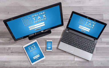 Online tax service concept on different devices