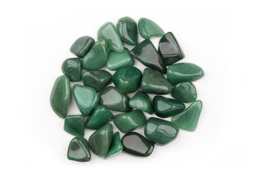 A pile of  green Aventurine gemstones isolated on white background.