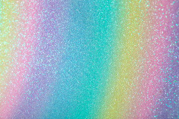 Iridescent rainbow background with glitter. Gradient stock texture with fine sparkles