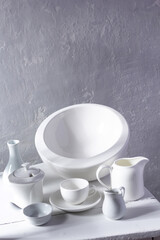 Empty crockery or ceramic dishes set. White kitchen dishware and tableware