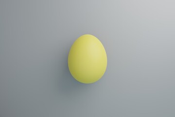 Yellow egg on a grey background. Concept holiday illustration in trendy colors