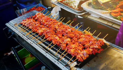 Grilled chicken with Sia wood sold at the Thai market.