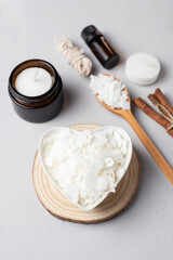 Basic set for home-made natural white eco soy wax candles in glass, wick, perfume. Idea for a hobby, business. Making trendy diy candles without harm to health on white background. 