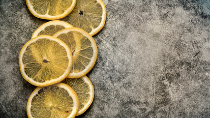 lemon slices on the left side, writing space on the right side.