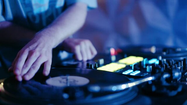 DJ plays in the club