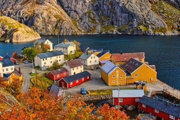 A lovely Norwegian village in the fjords in autumn 