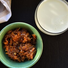 Gulkand, a rose oetal preparation and glass full of milk