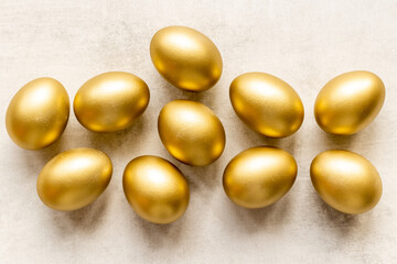 Set of golden eggs. Easter decoration. Wealth and good luck concept. Overhead view