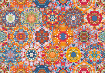 Decorative seamless pattern with colorful mandalas. Vector design. Print for fabric in boho style.