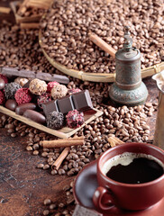 Various chocolates and black coffee.