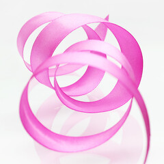 festive swirling ribbon on a white background