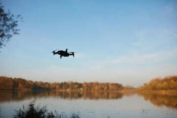 Fototapeta na wymiar silhouette of a drone and tree