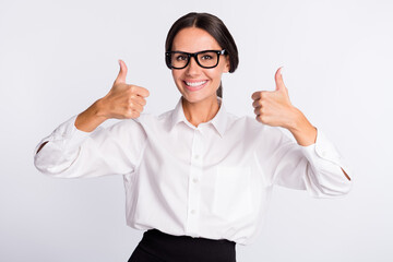 Photo of optimistic brunette hairdo lady show thumb up wear shirt isolated on grey color background