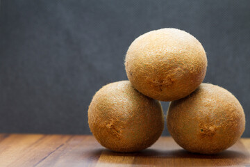 kiwi fruit on wooden background