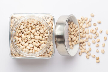 Close up of Organic soybean,  (Glycine max ) or soya bean dal in a glass jar with Lid. Top view 