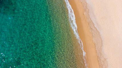 Fototapeta na wymiar aerial view of water sea on the beach with turquoise colors