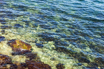 Sea coast. Nice view of the crystal clear sea and the coastline on a sunny summer day.