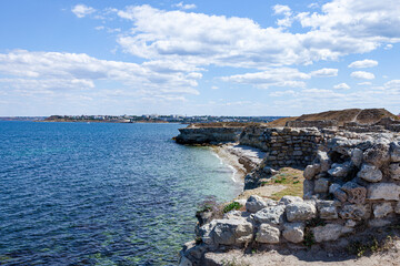 Sea coast. Nice view of the crystal clear sea and the coastline on a sunny summer day.