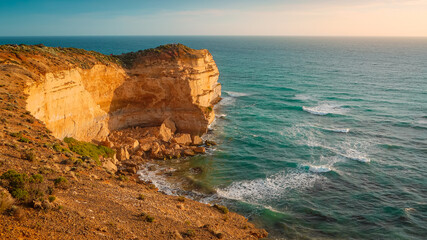 Coastline at the Great Ocean Road in Australia at sunset