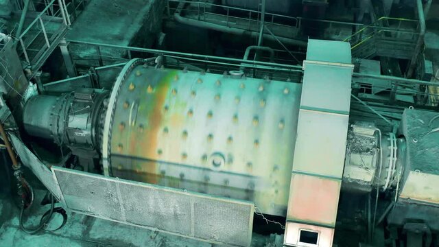 Top view of a rotating grinding mill in the mining factory