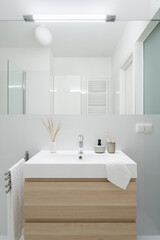 Fototapeta na wymiar Classic bathroom washbasin with cabinet