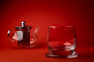 coffee with milk and ice on a red background