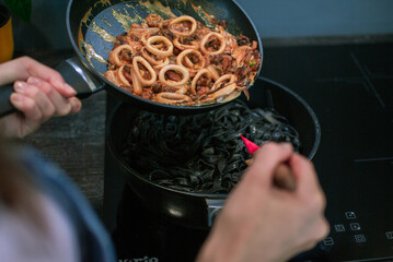 cooking pasta in the kitchen