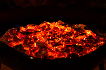 hot coals burning in a fireplace