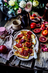 crepe suzette with bloody oranges .selective focus.