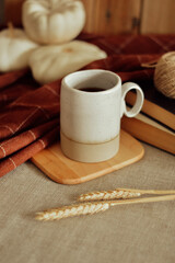 stilllife with cup of coffee and books