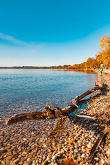 Fototapeta na wymiar Beautiful autumn or indian summer view at the famous Chiemsee, Chieming, Bavaria, Germany