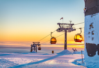 Cable Car Passes Setting Sun, Yllas, Finland