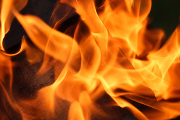wood background is burning with fire
