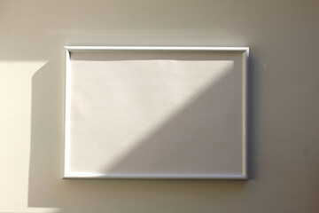 Empty white frame on white table