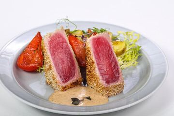 Tuna fish tataki in sesame seeds