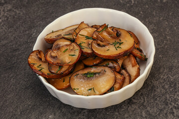 Roasted champignon with herbs and spices