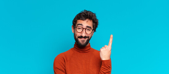 young crazy bearded man proud expression. copy space concept