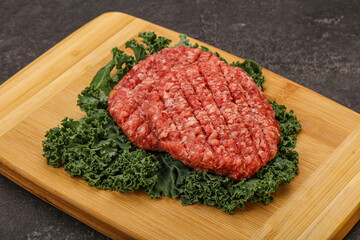 Raw beef burger cutlet for cooking