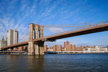 Fototapeta na wymiar Brooklyn bridge in Manhattan, New York, USA. Sunny winter day