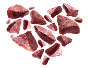 Pieces of fresh meat in the shape of a heart on a white background