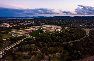 Aerial view of the Australian Parliament House at evening twilight in Canberra, the Australian Capital Territory  © Steve