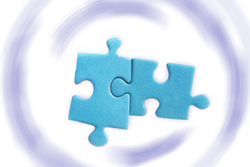 Puzzles on a white background. Solution and teamwork concept
