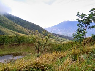 the view above the mountain clouds in Indonesia is so beautiful