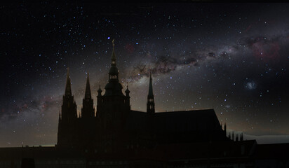 Ancient medieval castle against the background of the night starry sky