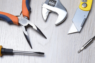 tools for minor home repairs are on the countertop. view from above.