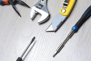 tools for minor home repairs are on the countertop. view from above.
