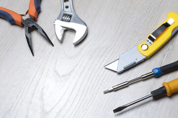 tools for minor home repairs are on the countertop. view from above.